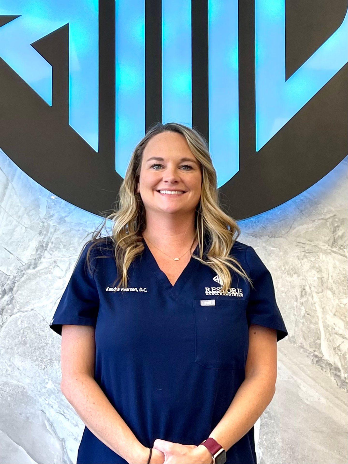 Dr. Kendra Pearson, D.C., Founder & Chiropractor at Restore Muscle and Joint in Kansas City